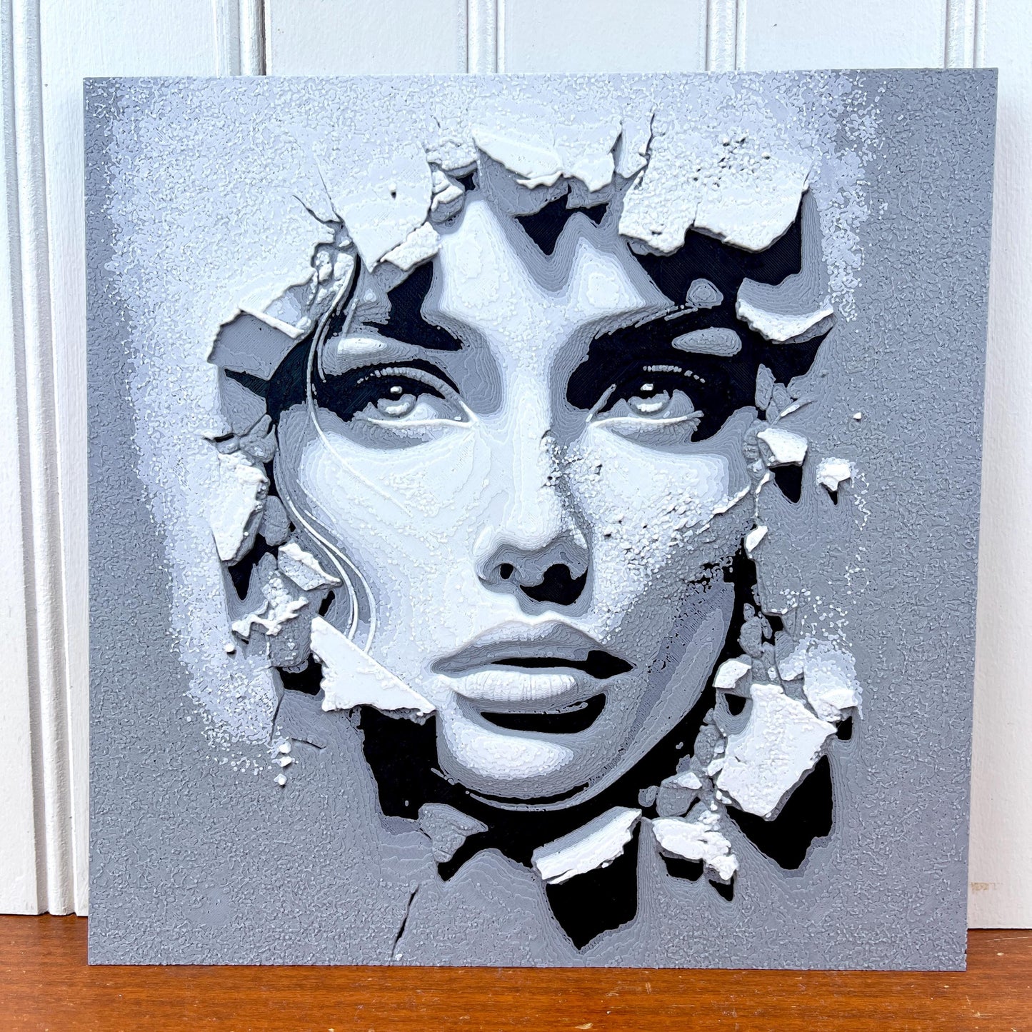 Hueforge Wall Art, Face in the Wall, Striking Monochrome,  Woman’s Face Breaking Through, Textured 3D Art